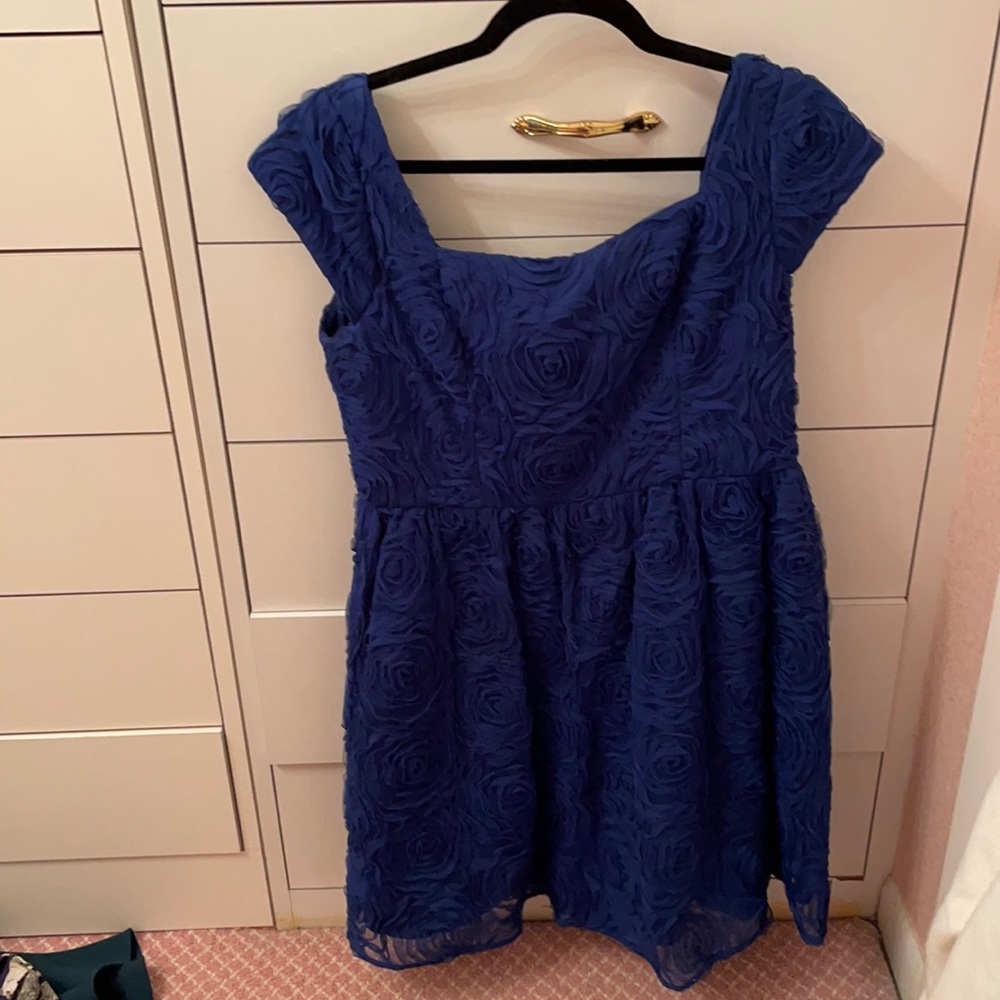 Adriana Papell navy dress with flowers throughout